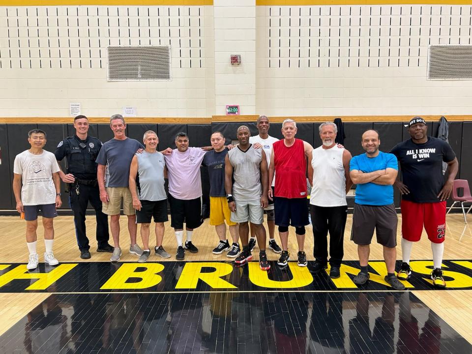 The quick actions and training of members of an over 40 men's basketball league credited with helping to save a player's life in South Brunswick.