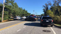 <p>Police cars block off Edgewood Road near the entrance to Emmorton Business Park where the Harford County Sheriff’s office says multiple people were shot Wednesday morning. (Photo: Ted Hendricks/The Aegis/BSMG) </p>