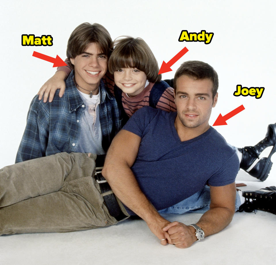 andy, joe, and matthew lawrence posing in the 90s