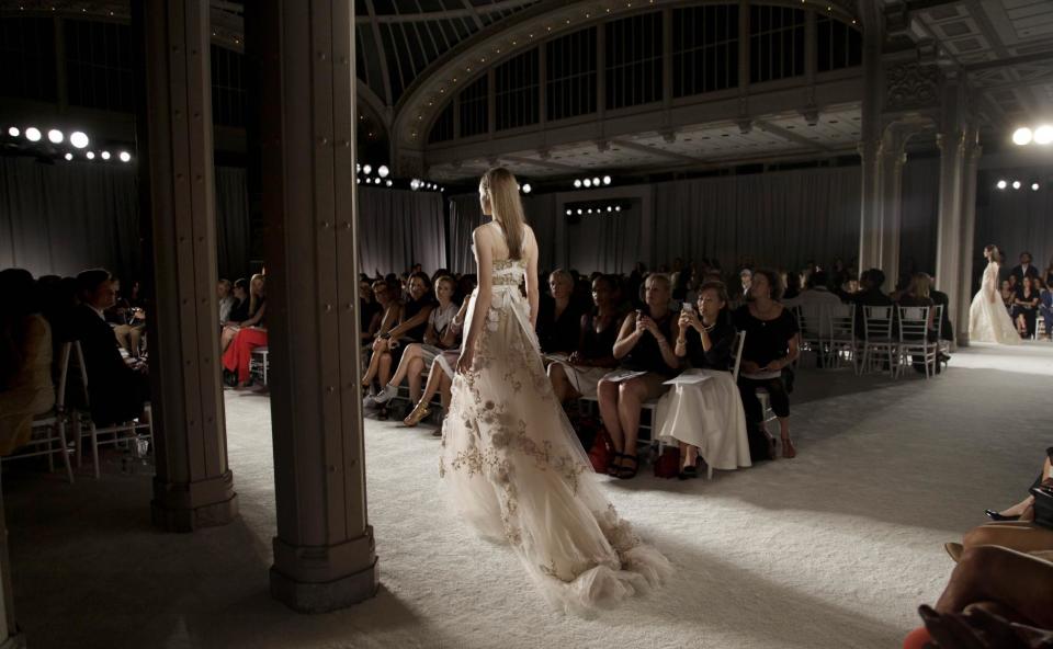 The Marchesa Spring 2014 collection is modeled during Fashion Week in New York, Wednesday, Sept. 11, 2013. (AP Photo/Seth Wenig)