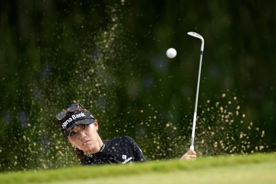Lydia Ko hits out of a bunker on the 17th hole during a practice round for The Chevron Championship golf tournament Wednesday, April 19, 2023, in The Woodlands, Texas. (AP Photo/David J. Phillip)