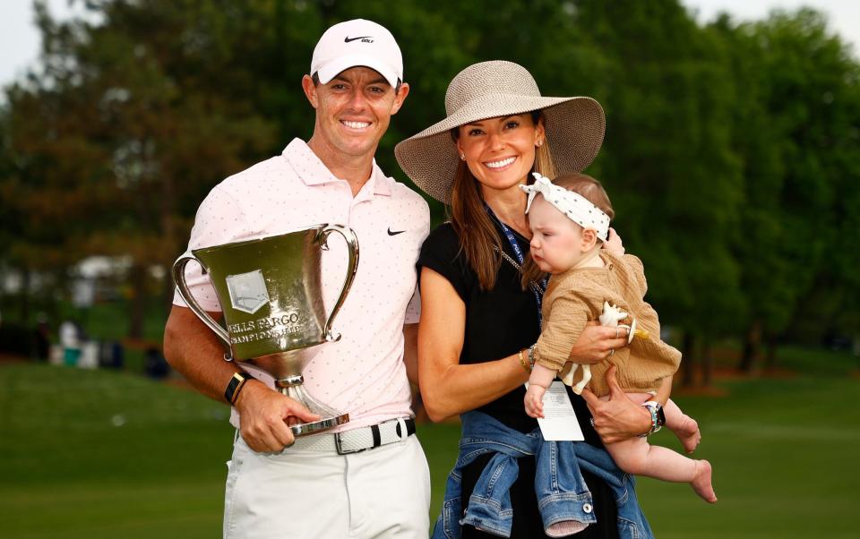 Rory McIlroy and his wife Erica with their child Poppy