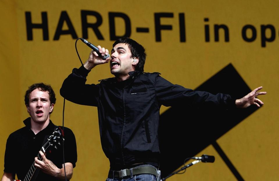 Richard Archer (centre) performing with Hard-Fi at T in the Park, 2006 (Getty)