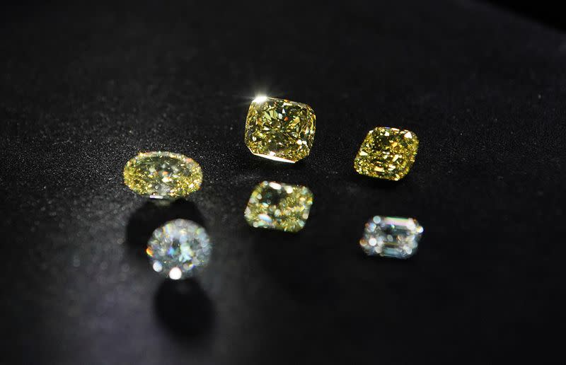 A view shows polished colorless and yellow diamonds produced at "Diamonds of ALROSA" factory in Moscow