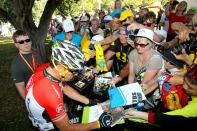 Lance Armstrong of the US signs autographs prior to the 51 km Cancer Council Classic cycling race, part of the 2011 Tour Down Under, in Adelaide on January 16, 2011. The Tour Down Under cycling event runs from January 16-23. IMAGE STRICTLY RESTRICTED TO EDITORIAL USE STRICTLY NO COMMERCIAL USE AFP PHOTO / MARK GUNTER (Photo credit should read Mark Gunter/AFP/Getty Images)