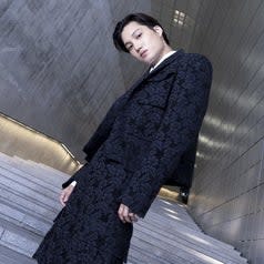 EXO member Kai poses at Dongdaemun Plaza for Seoul Fashion Week