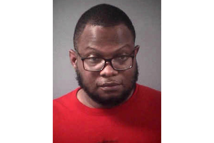 FILE- This undated photo provided by the Grand Forks County Correctional Center shows Steve Shand, charged with human smuggling related to the deaths last year of four immigrants near the Canadian border. An indictment released last week charges Harshkumar Ramanlal Patel, with seven human smuggling counts. Four of them also name the man he allegedly hired, Steve Shand, of Deltona, Fla., to drive Indian nationals from the Canadian border to the Chicago area. (Grand Forks County Correctional Center via AP, File)