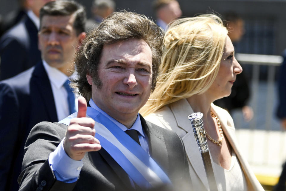 Argentina's newly sworn-in President Javier Milei arrives to the government house in Buenos Aires, Argentina, Sunday, Dec. 10, 2023. (AP Photo/Julian Bongiovanni)