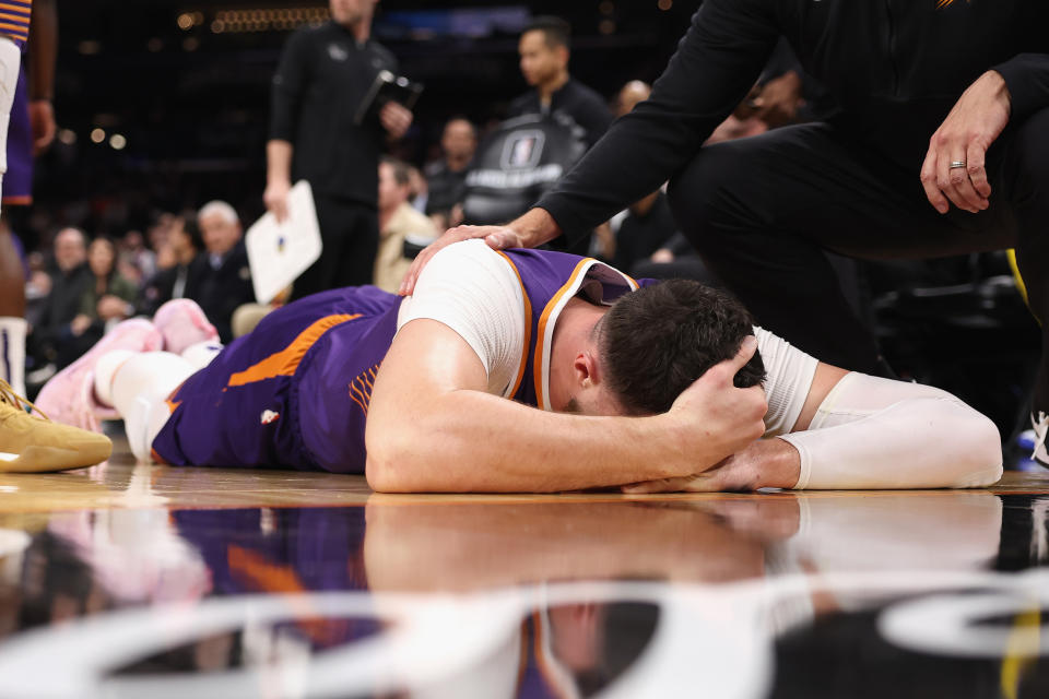 Jusuf Nurkić on the ground after being fouled. (Christian Petersen/Getty Images)