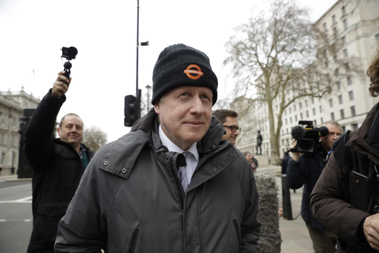 Boris Johnson, Britain's former Foreign Secretary and prominent leave the European Union Brexit campaigner walks away after leaving the Cabinet Office in London, Tuesday, March 19, 2019. Prime Minister Theresa May suffered a setback Monday when former Foreign Secretary Boris Johnson refused to support her Brexit deal. (AP Photo/Matt Dunham)