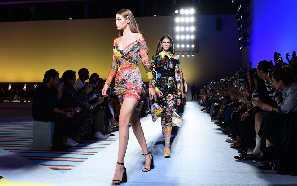 Versace is reportedly set to be acquired by Michael Kors in a $2bn deal - AFP