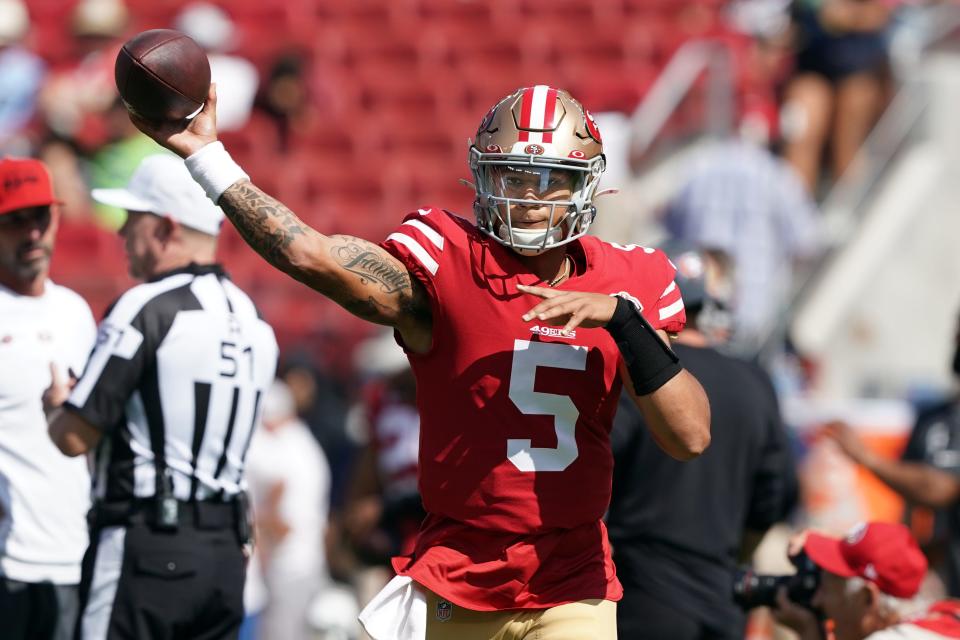 San Francisco 49ers quarterback Trey Lance (5) warms up before the game against the Seattle Seahawks at Levi's Stadium.