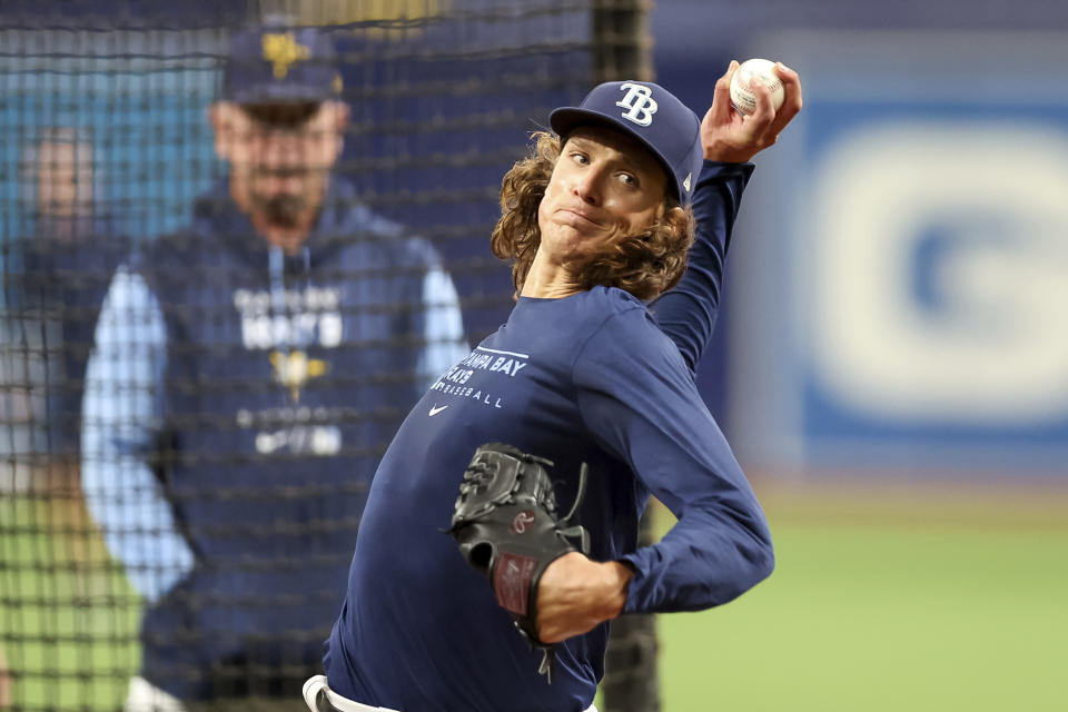Tampa Bay Rays starting pitcher Tyler Glasnow throws a live batting practice as he returns from Tommy John surgery prior to a baseball game against the Los Angeles Angels, Tuesday, Aug. 23, 2022, in St. Petersburg, Fla. (AP Photo/Mike Carlson)