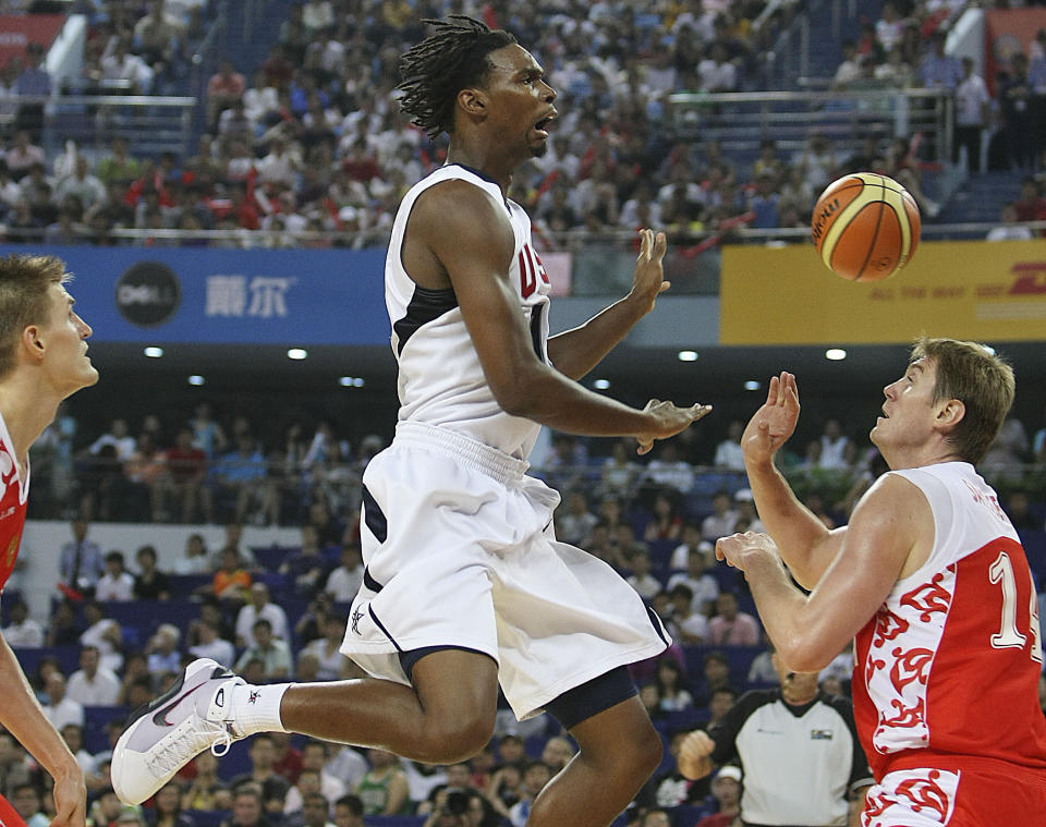 Chris Bosh of USA men's basketball team for the Beijing 2008 Olympics reacts after missing to score during a match between USA and Russia as a warm-up for Olympics at the USA Basketball International Challenge tournament in Shanghai Sunday Aug. 3, 2008. US won 89-68. 