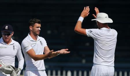 Cricket - Pakistan v England - Third Test - Sharjah Cricket Stadium, United Arab Emirates - 1/11/15 England's James Anderson (2nd L) celebrates taking the wicket of Younis Khan (not pictured) Action Images via Reuters / Jason O'Brien Livepic -