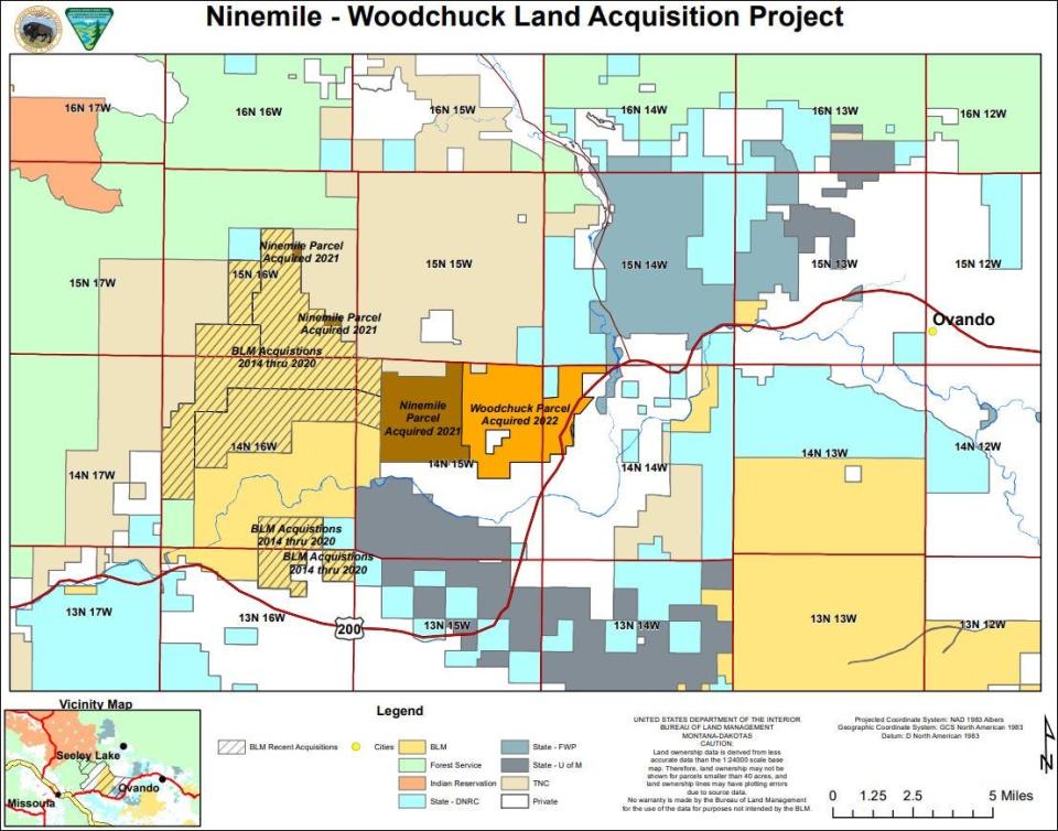 The BLM's Ninemile-Woodchuck land acquisitions are shown in orange and brown near the center of the map. Lighter, yellow shaded lands include those currently owned by The Nature Conservancy.