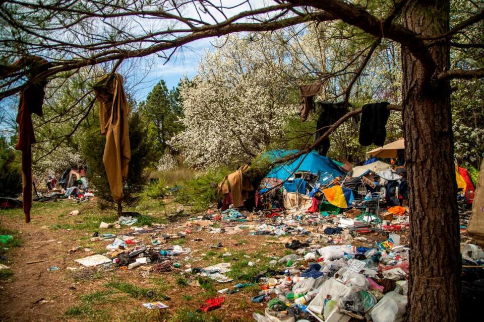 A homeless camp between Interstate 540 and an exit ramp to Capital Boulevard as it looked in March 2021.