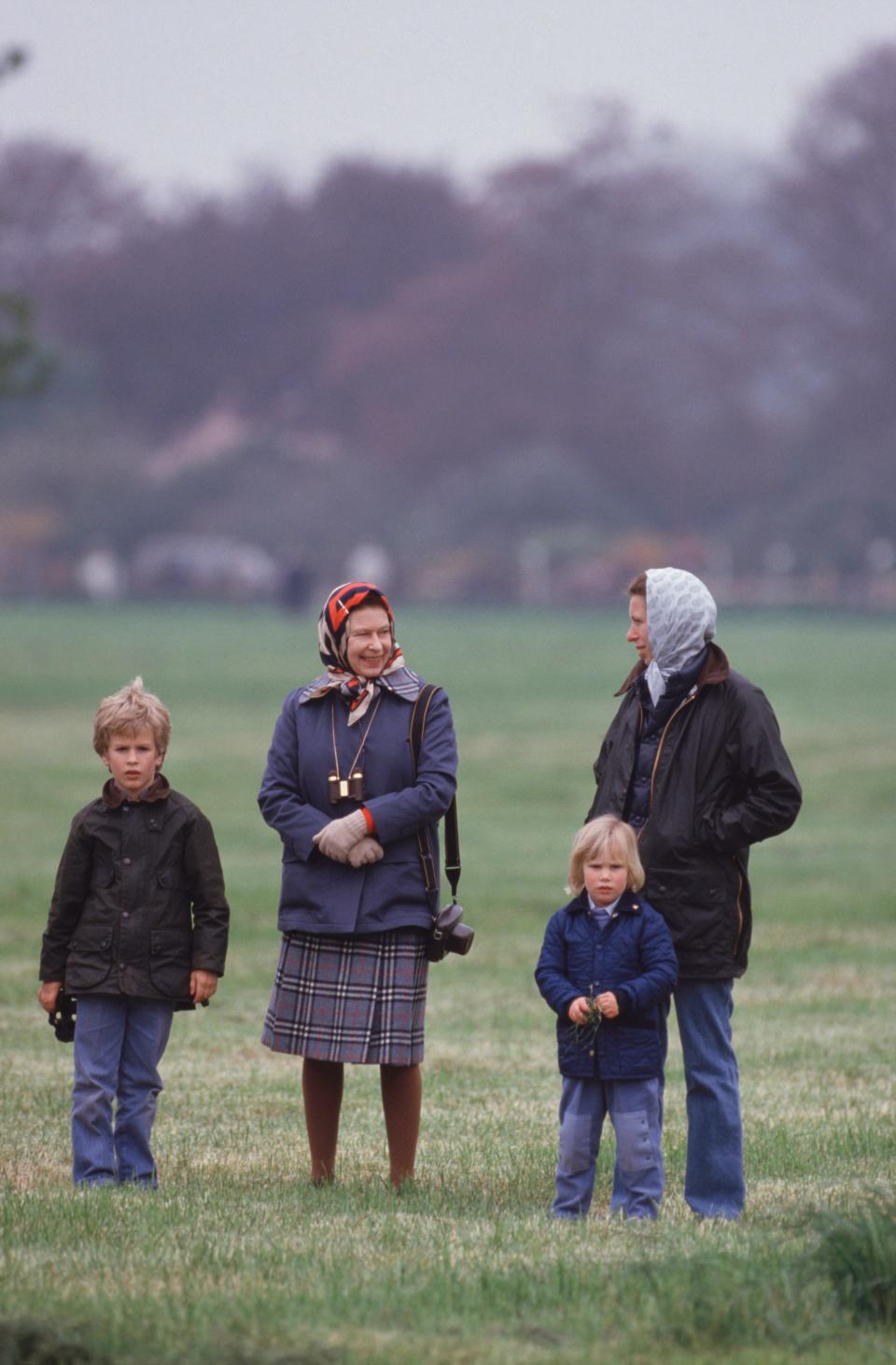 Queen Elizabeth II and Princess Anne with Anne's children Peter and Zara Phillips in Windsor on May 12, 1985.