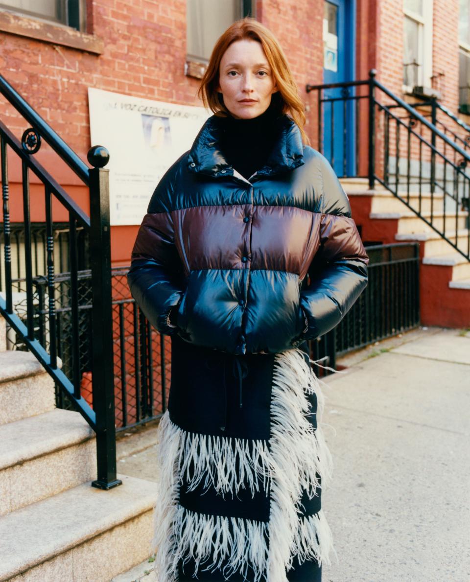 Audrey Marnay layers up in a Moncler jacket and <a rel="nofollow noopener" href="https://weallwear.moncler.com/" target="_blank" data-ylk="slk:Moncler hooded sweater;elm:context_link;itc:0;sec:content-canvas" class="link ">Moncler hooded sweater</a>, $480.