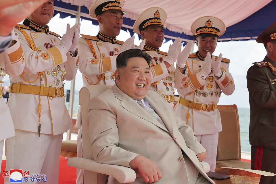 In this photo provided by the North Korean government, North Korea leader Kim Jong Un, bottom, attends a launching ceremony of what is says a new nuclear attack submarine "Hero Kim Kun Ok" at an unspecified place in North Korea Wednesday, Sept. 6, 2023. Independent journalists were not given access to cover the event depicted in this image distributed by the North Korean government. The content of this image is as provided and cannot be independently verified. Korean language watermark on image as provided by source reads: "KCNA" which is the abbreviation for Korean Central News Agency. (Korean Central News Agency/Korea News Service via AP)