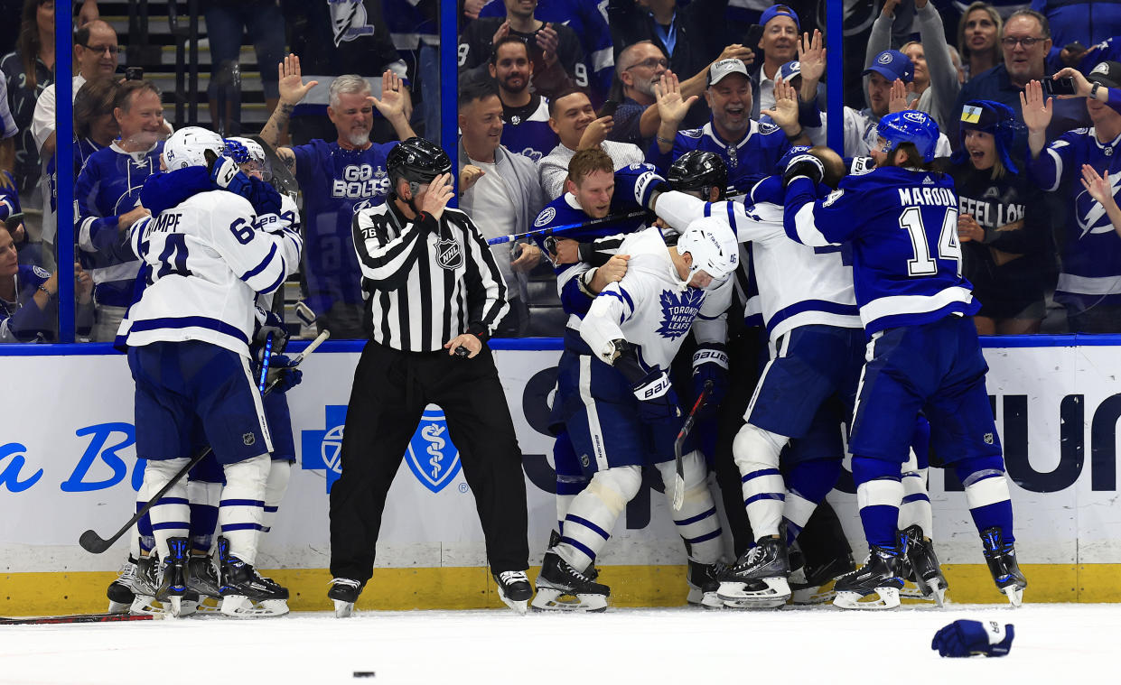 TAMPA, FLORIDA - APRIL 21: The Tampa Bay Lightning and the Toronto Maple Leafs fight in the third period during a game  at Amalie Arena on April 21, 2022 in Tampa, Florida. (Photo by Mike Ehrmann/Getty Images)