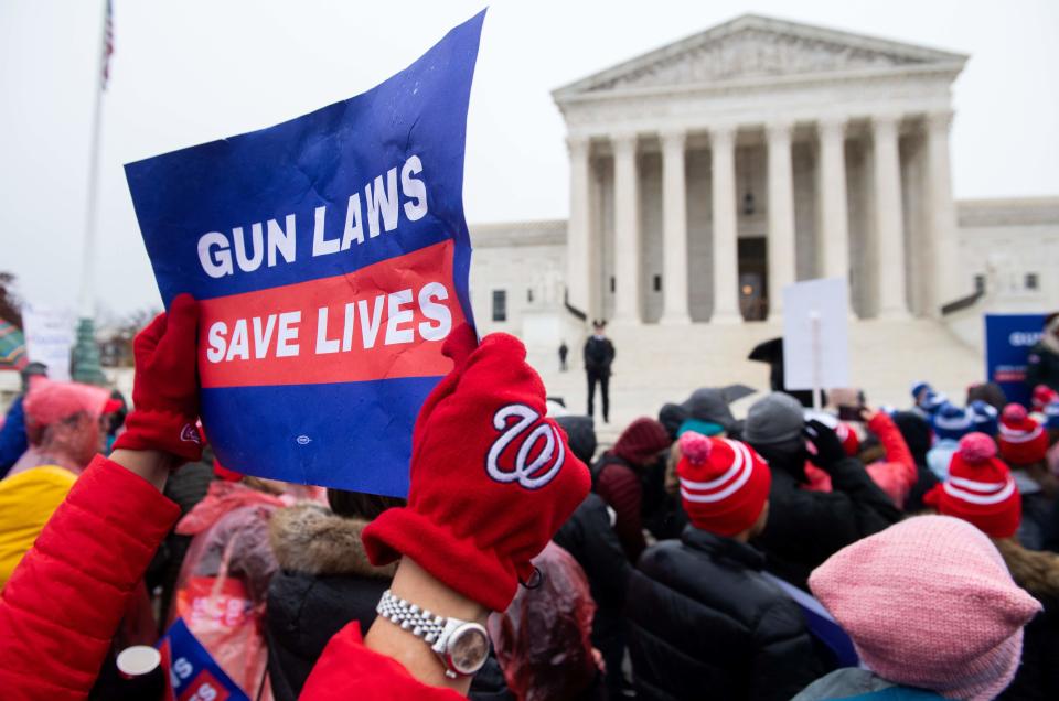 Supporters of gun control and firearm safety measures hold a protest rally outside the US Supreme Court as the Court hears oral arguments in State Rifle and Pistol v. City of New York, NY, in Washington, DC, December 2, 2019. - The case marks the first time in nearly 10 years that the Supreme Court has heard a Second Amendment gun ownership case. (Photo by SAUL LOEB / AFP) (Photo by SAUL LOEB/AFP via Getty Images) ORIG FILE ID: AFP_1MR16C