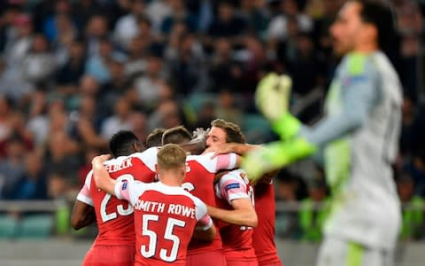Arsenal celebrate Sokratis' first goal for the club - Credit: ALEXANDER NEMENOV/AFP/Getty Images