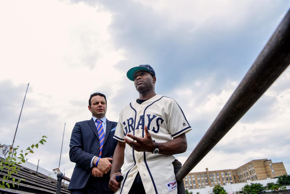 Harold Reynolds, former MLB player and television analyst for MLB Network and Fox Sports, is named the Ambassador of Hinchliffe Stadium by Paterson Mayor Andr&#xe9; Sayegh at the stadium in Paterson  on Thursday August 13, 2020. Sayegh and Reynolds in the stands.