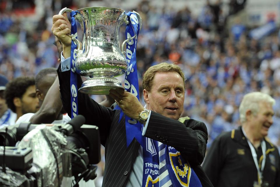 Portsmouth manager Harry Redknapp celebrates with the FA Cup.   (Photo by Rebecca Naden - PA Images/PA Images via Getty Images)