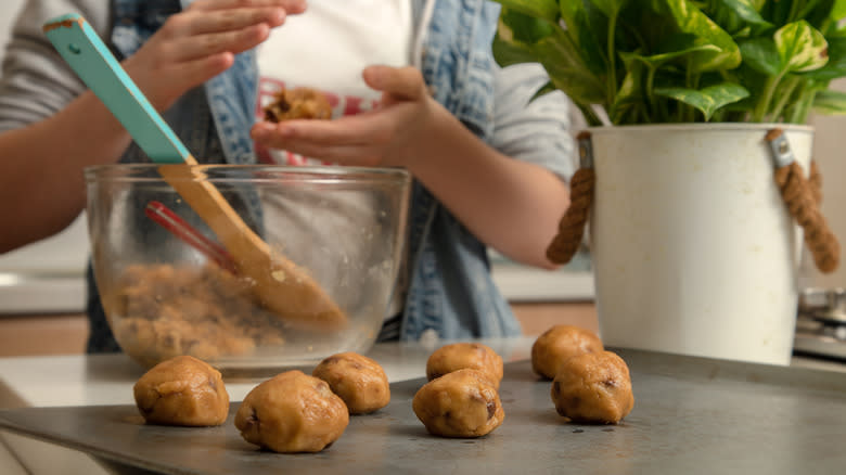 Person making cookies