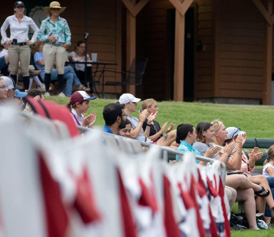 Attendees watch competitors during the first day of the Germantown Charity Horse Show on Tuesday, June 7, 2022, at the show grounds, 7745 Old Poplar Pike. The show continues through June 11. 