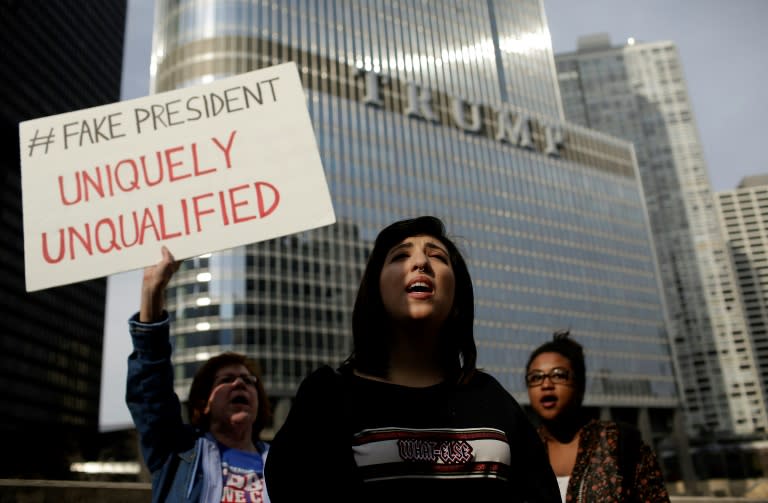 Demonstrators protest US President Donald Trump outside Trump International Hotel & Tower on February 20, 2017 in Chicago, Illinois