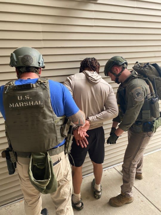 Photos from the U.S. Marshals of the taking Shawn Jason into custody