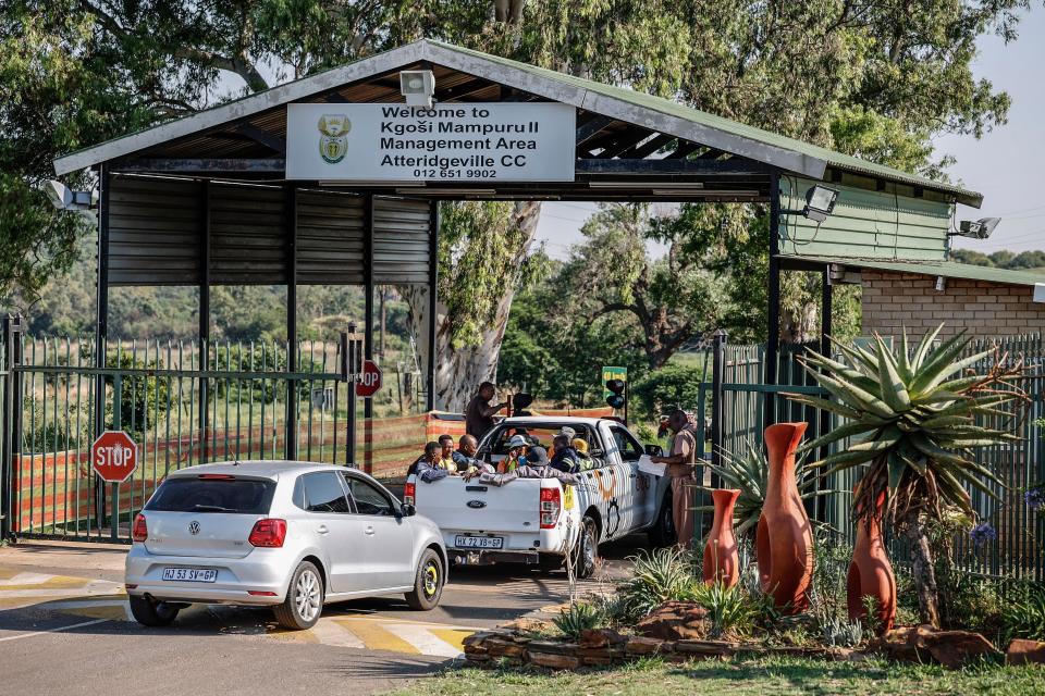 Prison staff at the Atteridgeville Correctional Centre in Pretoria, South Africa, search cars on November 24, hours before Pistorius was granted parole.