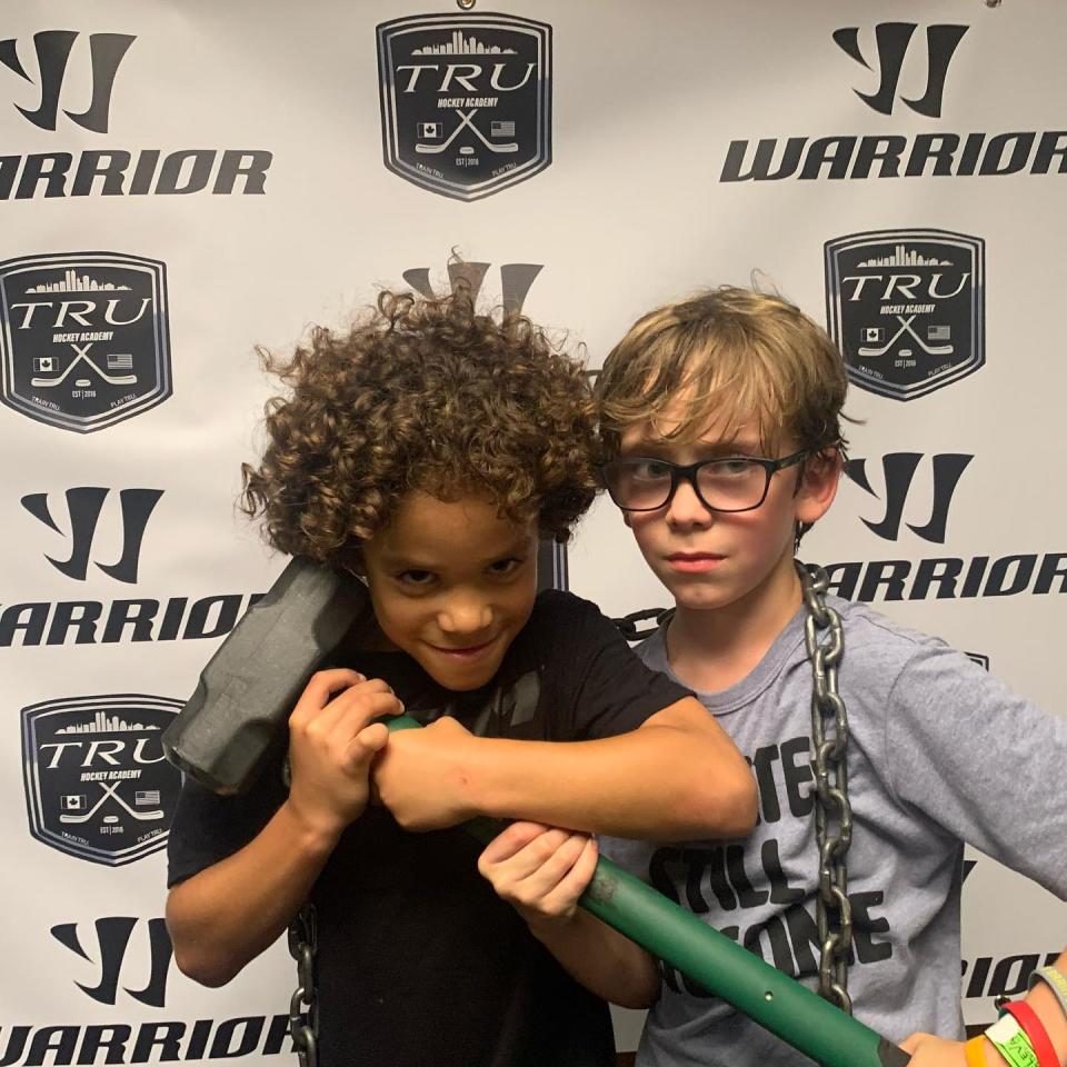 Liam Reef (left) and Krue Scols were awarded the sledgehammer and chains as "Beasts of the Day" in their group at the Tru Hockey Academy in mid-July, 2023. The honor is chosen by academy founder Jean-Guy Trudel at the end of camp each day for a player who applied relentless work ethic and execution of the school's hockey system.