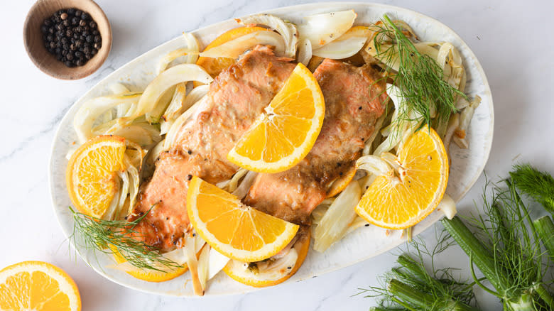 salmon with orange, fennel on platter