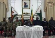 In his speech, telecast by the Zimbabwe Broadcasting corporation (ZBC), Mugabe defied expectations he would quit and said he would preside over an upcoming party congress. He was flanked by the generals who are behind the country's military takeover