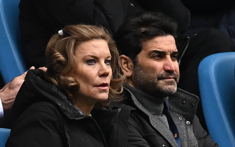 Newcastle United's English minority owner Amanda Staveley (L) and her husband, Newcastle United Director, Mehrdad Ghodoussi (R) take their seats for the English Premier League football match between Manchester City and Newcastle United at the Etihad Stadium in Manchester