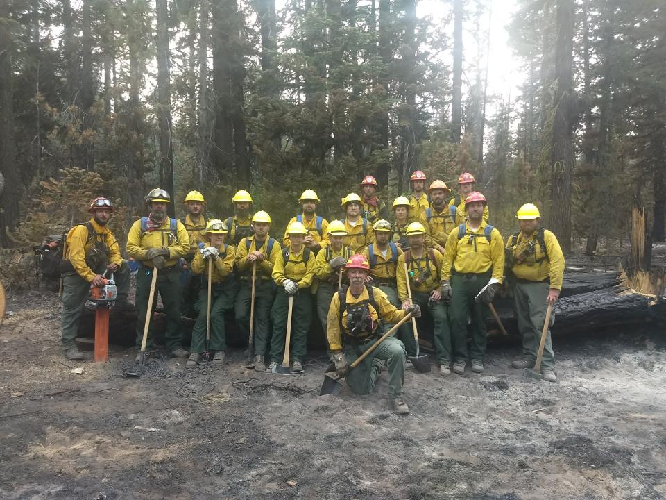 The Ohio crew stops for a picture at the end of their last workday on the Timber Crater 6 Fire in Crater Lake National Park, Oregon.