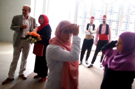 Guests wait for a collective Sharia wedding ceremony for sixty couples in Sarajevo, Bosnia and Herzegovina July 19, 2018. REUTERS/Dado Ruvic