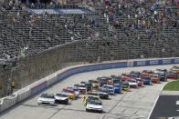 Drivers get the green flag to start a NASCAR Xfinity Series auto race at Texas Motor Speedway in Fort Worth, Texas, Saturday, June 12, 2021. (AP Photo/Larry Papke)