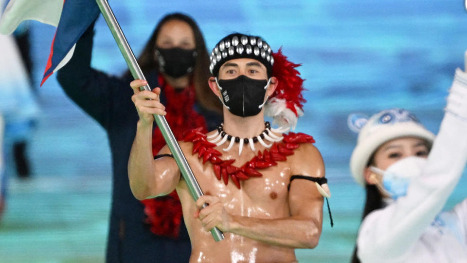 Shirtless American Samoa flagbearer Nathan Crumpton captured the world's attention at the Winter Games opening ceremony. Pic: Getty