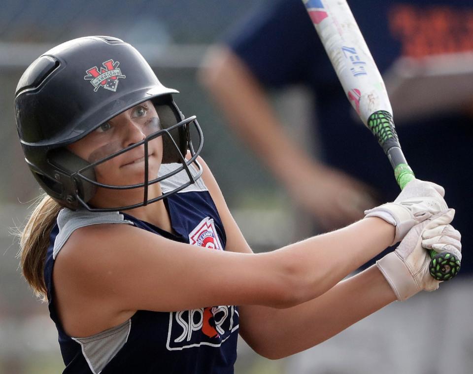 Play It Again Sports’ Brianna Gehrman bats against VFW Auxiliary during the Appleton Little League city championship softball game Thursday at Scheels USA Youth Sports Complex in Appleton. Play It Again Sports defeated VFW Auxiliary 12-3.