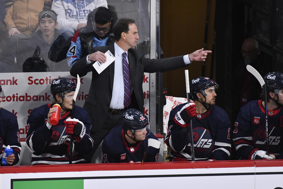 Winnipeg Jets associate coach Scott Arniel gestures to players during the third period of the team's NHL hockey game against the St. Louis Blues on Tuesday, Oct. 24. 2023, in Winnipeg, Manitoba. (Fred Greenslade/The Canadian Press via AP)