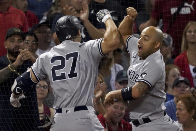 New York Yankees' Giancarlo Stanton runs the bases after hitting a two-run  home run off Boston Red Sox starting pitcher Nick Pivetta in the sixth  inning of a baseball game, Saturday, April