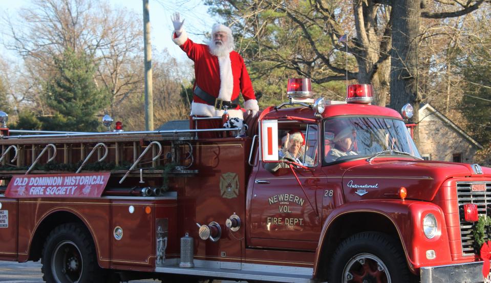 Santa waves to the crowd during the Chester Kiwanis Christmas Parade in 2014.