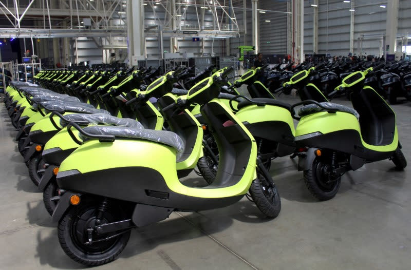 FILE PHOTO: Ola Electric's S1 Air e-scooters are pictured inside its manufacturing facility in Pochampalli