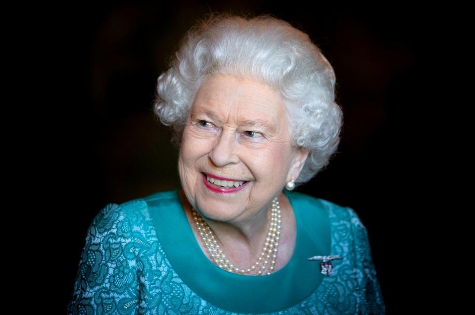 Queen Elizabeth II attends a reception for 603 (City of Edinburgh) Squadron, Royal Auxiliary Air Force, who have been honoured with the Freedom of The City of Edinburgh, at the Palace of Holyroodhouse in Edinburgh. (PA)