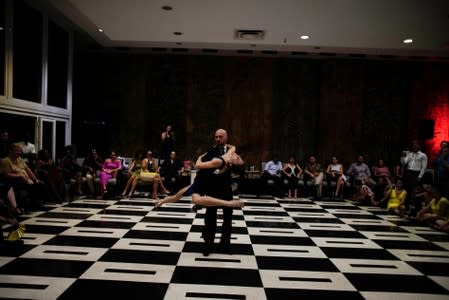 People dance tango in a hotel in Havana