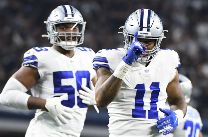 Pass rusher Micah Parsons (R) and the Dallas Cowboys will play the New York Giants at 8:20 p.m. EDT Sunday on NBC. File Photo by Ian Halperin/UPI